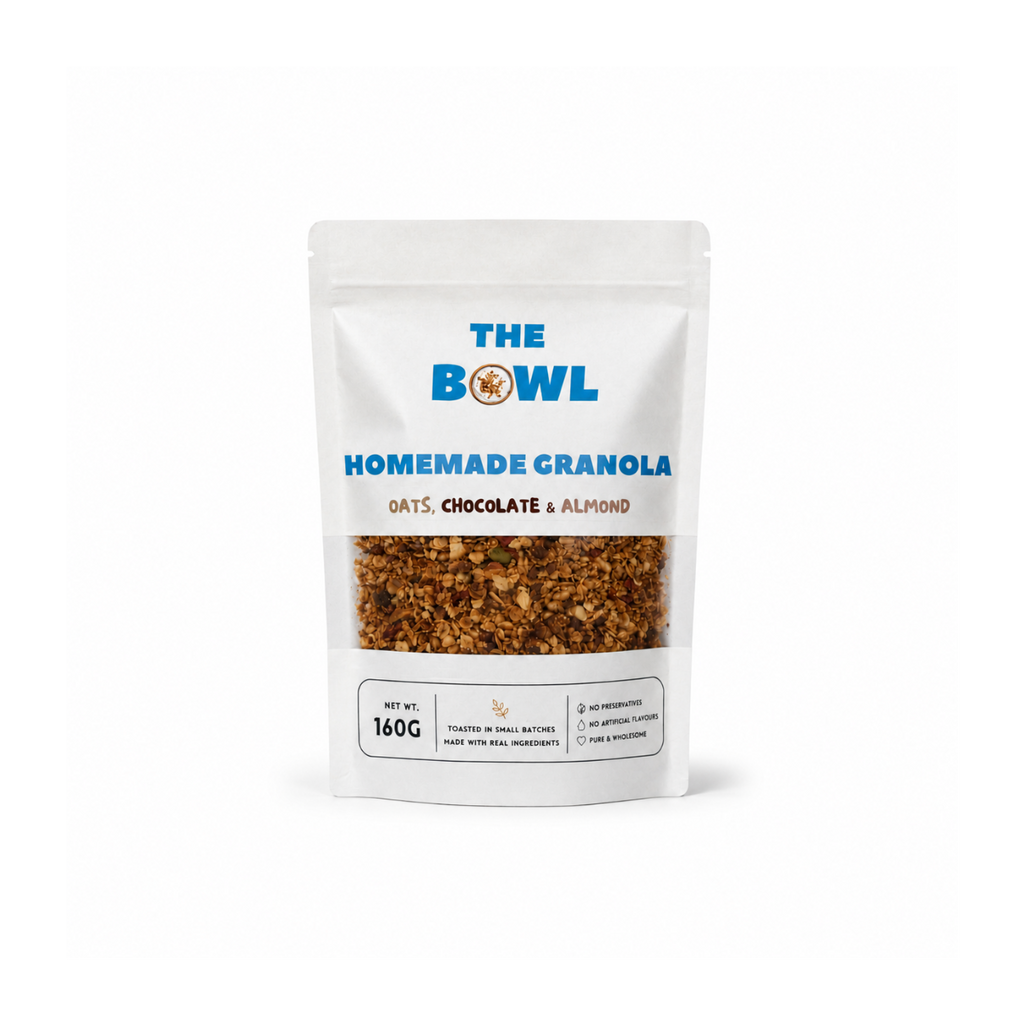 Bag of 'The Bowl' Homemade Granola with visible ingredients on a white background