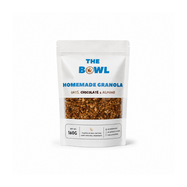Bag of 'The Bowl' Homemade Granola with visible ingredients on a white background